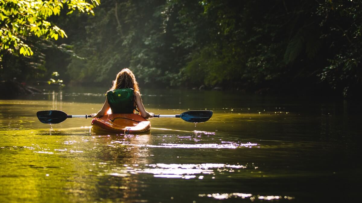 girl in kayak in river