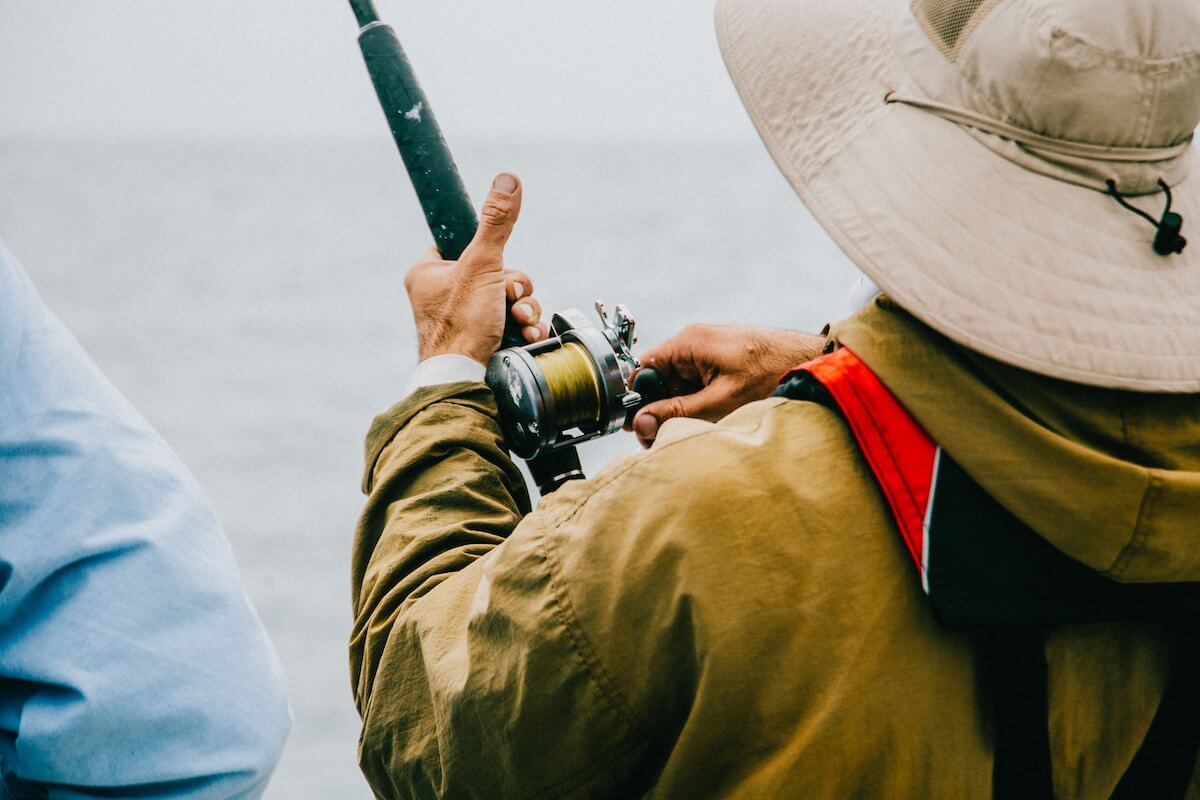 man in jacket fishing